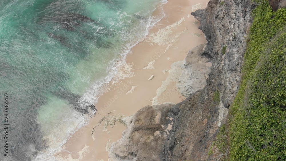 4K Aerial view of dreamland beach, Bali island.