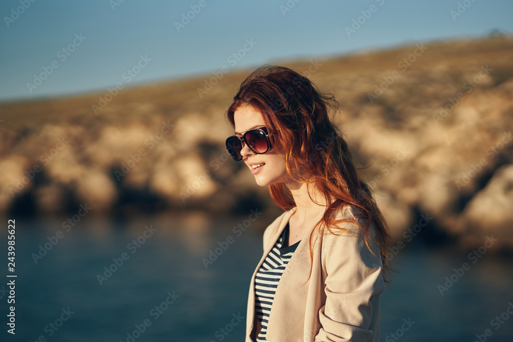 woman in sunglasses on the sea