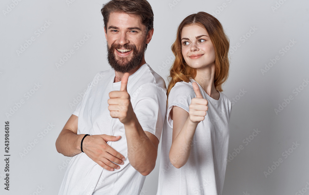 Fototapeta premium young couple show thumbs up