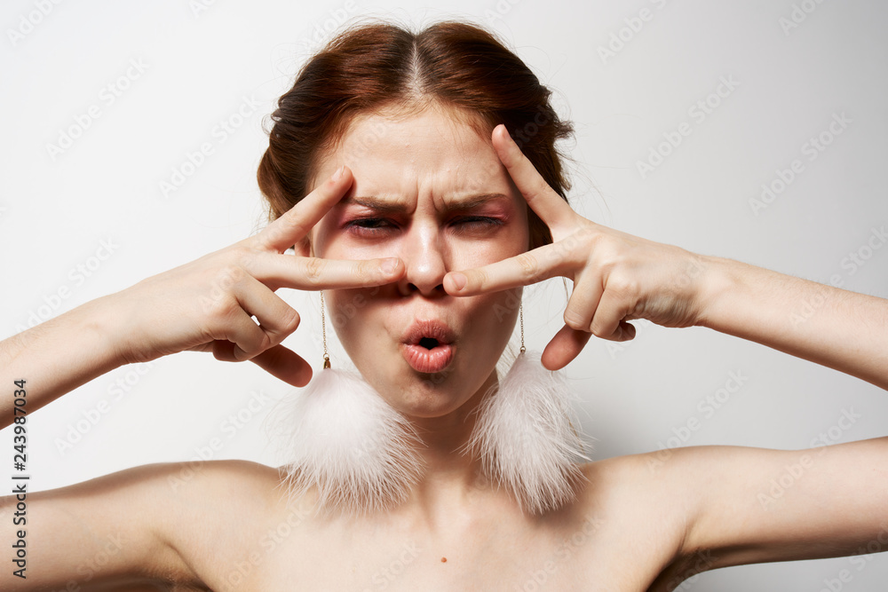 Fototapeta premium woman with earrings emotions face portrait