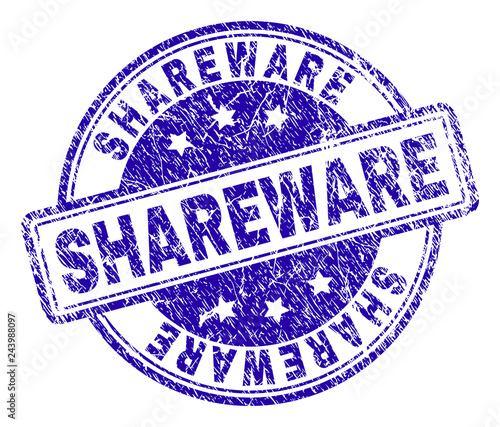 SHAREWARE stamp seal watermark with distress texture. Designed with rounded rectangles and circles. Blue vector rubber print of SHAREWARE text with unclean texture.