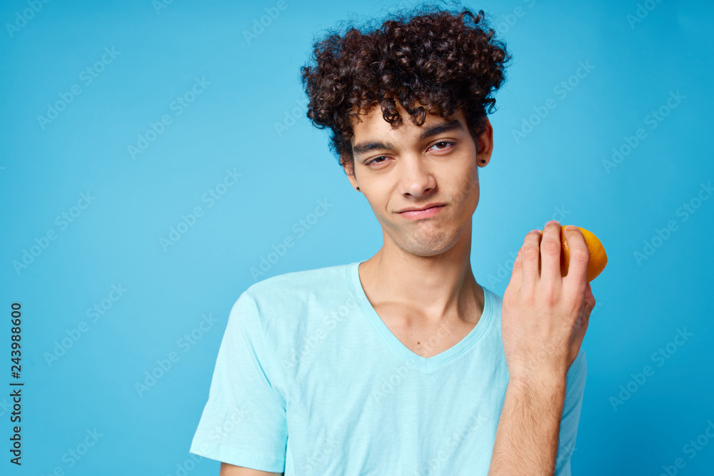 emotions man with orange on blue background emotions man with orange on blue background