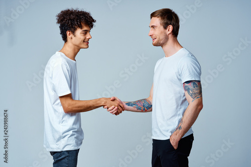 handshake greeting men friends
