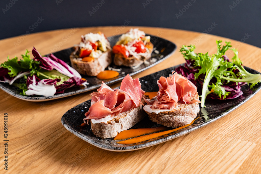 Sandwich with prosciutto, cheese and lettuce Sandwich with prosciutto, cheese and lettuce