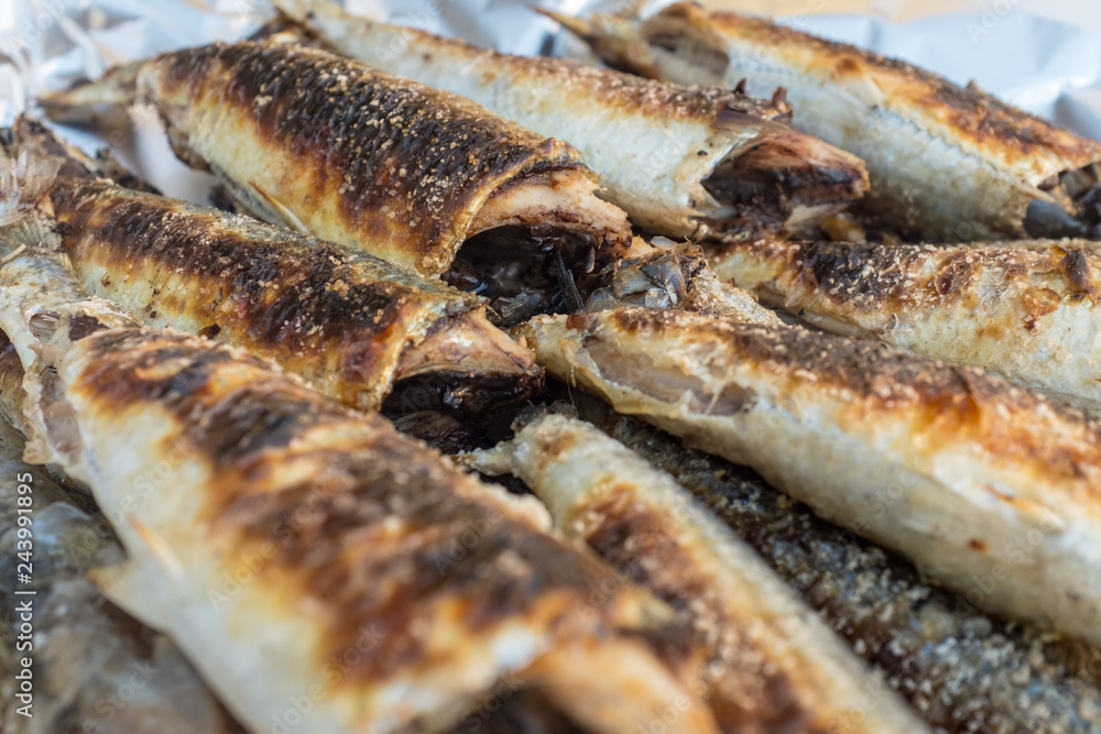 Grilled sardines in the fish souk, Salalah, Oman Grilled sardines in the fish souk, Salalah, Oman