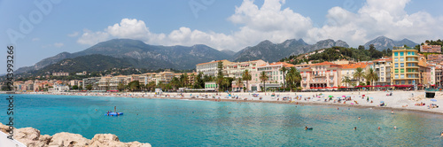 Menton France July 9th 2015 : Panoramic view of tourists and locals enjoying the sun on Menton beach in the south of France