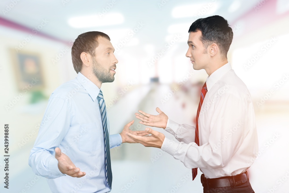 Young business men working together in office