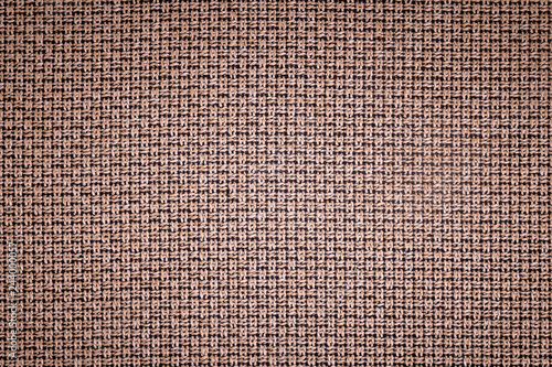 Textured background surface of textile upholstery furniture close-up. burlap brown color fabric structure