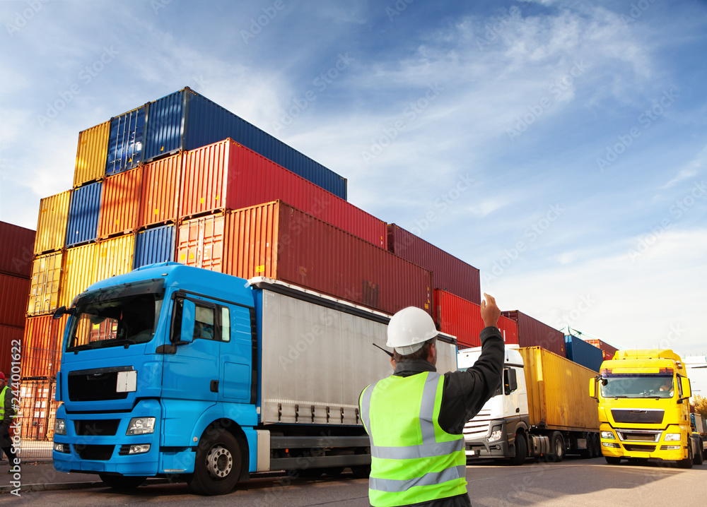 © sculpies - freight forwarding manager,worker, at container terminal © sculpies - freight forwarding manager,worker, at container terminal