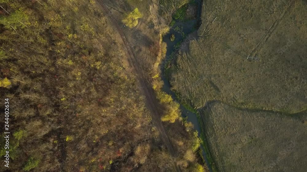 Flight over autumn mountains and small river. Flight over autumn mountains and small river.