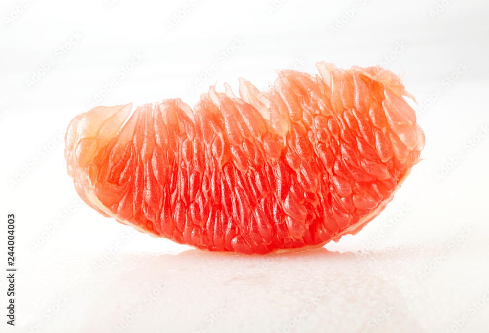 Fresh fruit grapefruit, closeup. On white background Fresh fruit grapefruit, closeup. On white background