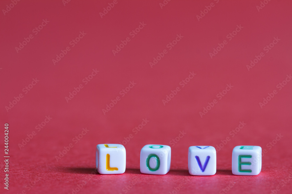 Love letters word on red background abstract valentines day concept Love letters word on red background abstract valentines day concept