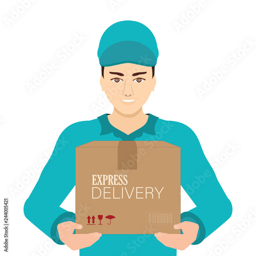 Smiling young delivery man in blue cap standing with parcel post box.