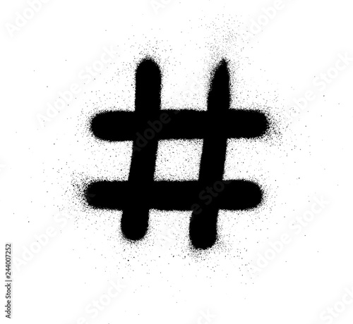 graffiti hashtag symbol sprayed in black over white