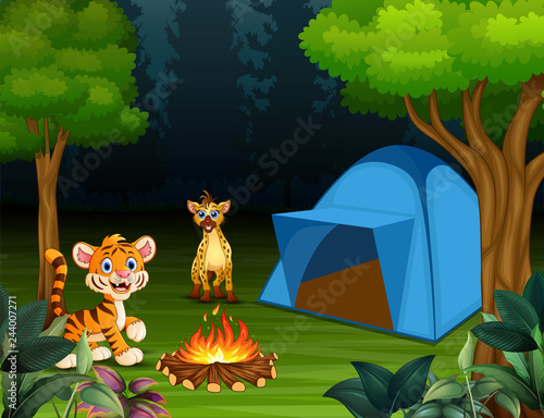 Cartoon a baby tiger and hyena in the campsite