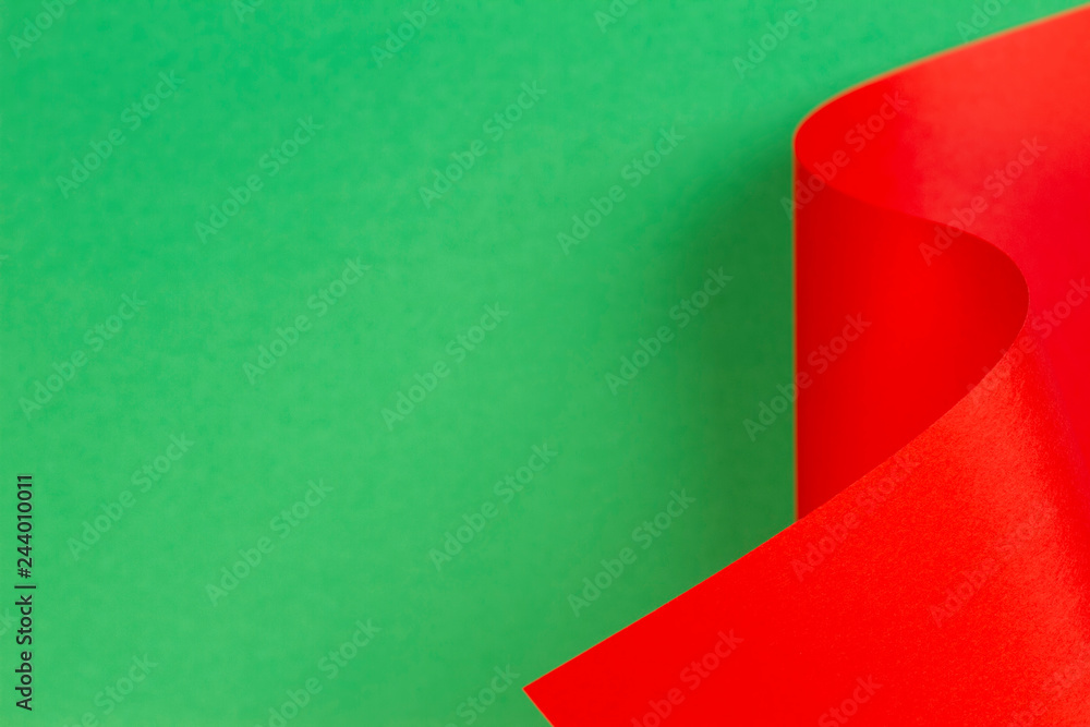 Abstract colorful background with red green color paper in geometric shapes. Selective focus