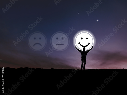 Fototapeta Naklejka Na Ścianę i Meble -  Men stand catch smiley face to get caught in the sky. Customer Experience Concept, Best Excellent Services for Satisfaction 