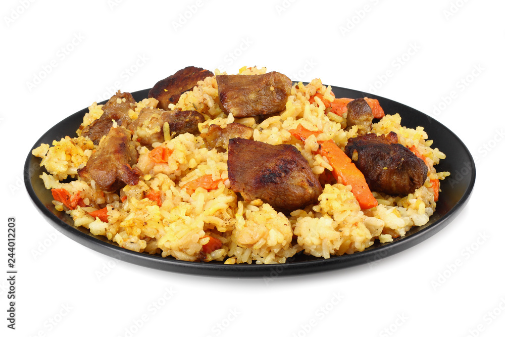 pilaf with meat on black plate isolated on white background