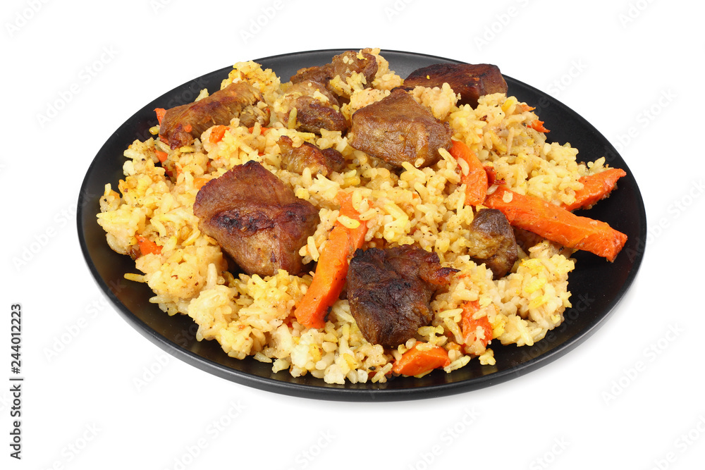 pilaf with meat on black plate isolated on white background pilaf with meat on black plate isolated on white background