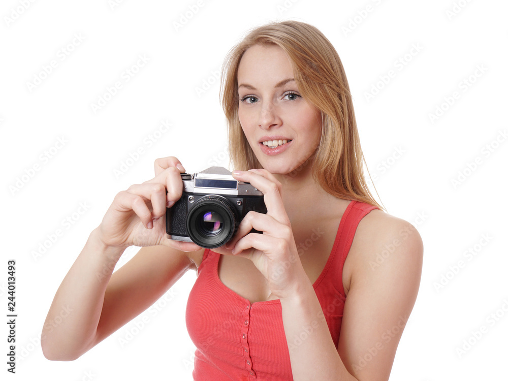 young woman taking picture with analog 35mm camera young woman taking picture with analog 35mm camera