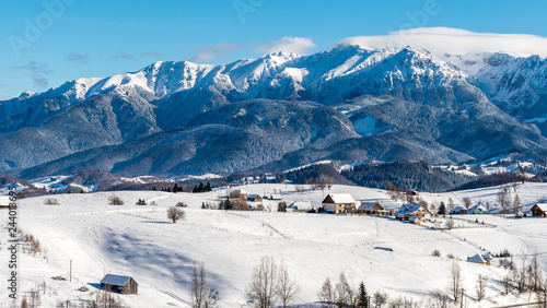 Brasov - Romania  Rucar - Bran snowy picturesque hills on a sunny cold December.