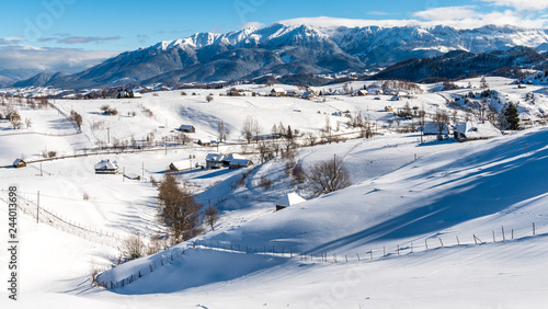 Obraz na plátne Brasov - Romania, Rucar - Bran snowy picturesque hills on a sunny cold December