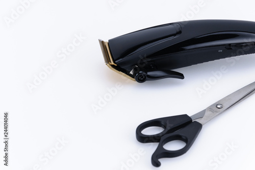 Close up of Hair Barber Clippers, Haircut accessories on white background with copy space. Focus on the knife.