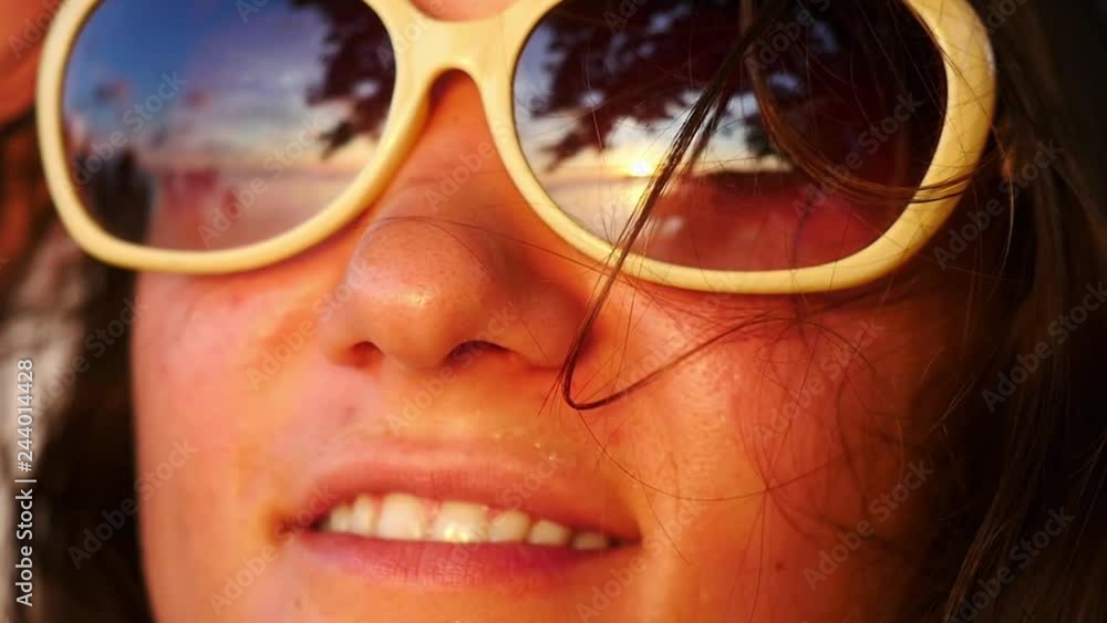 Young pretty woman in sunglasses looking at the sunset in slow motion. 1920x1080 Young pretty woman in sunglasses looking at the sunset in slow motion. 1920x1080