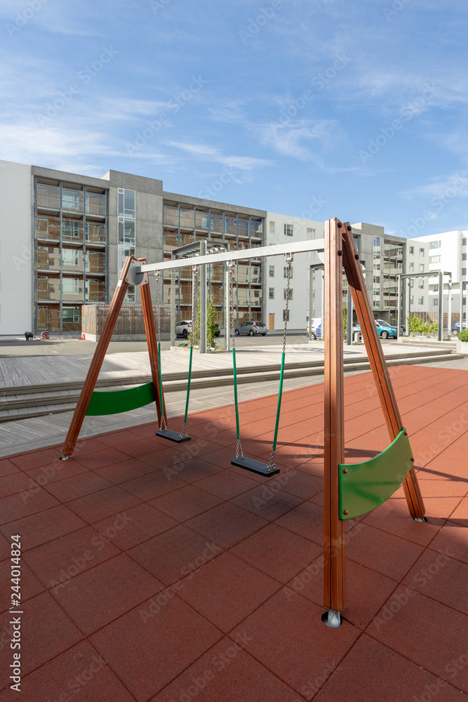 New playground on yard near the modern house New playground on yard near the modern house