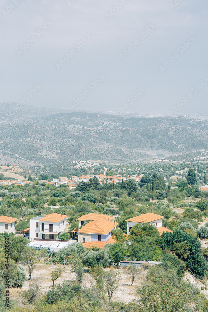 Beautiful Cypriot landscapes in summer. City streets and mountains in nature.