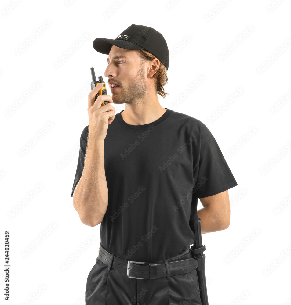 Male security guard with portable radio transmitter on white background Male security guard with portable radio transmitter on white background