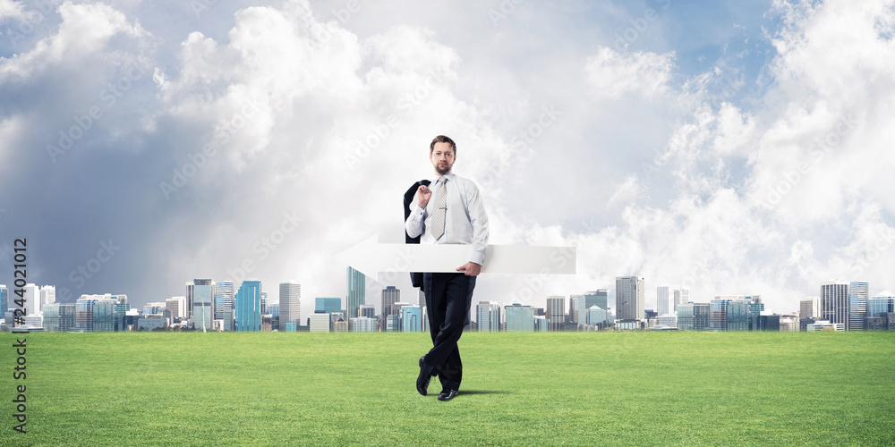 Conceptual image of businessman pointing aside Conceptual image of businessman pointing aside