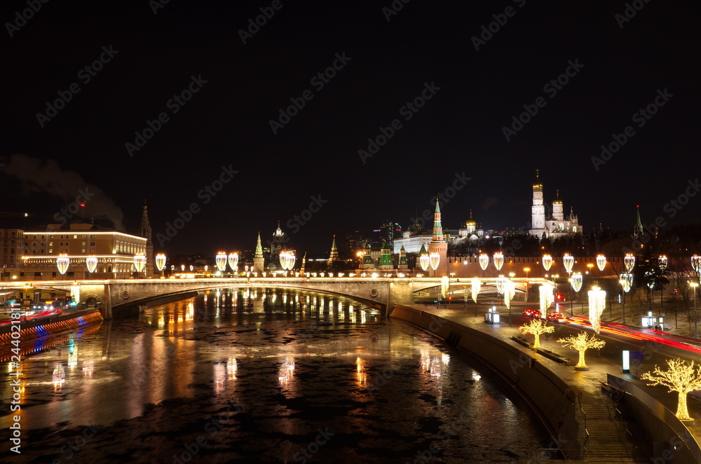 Evening view of the Moscow Kremlin and Big Moskvoretsky bridge with Christmas illumination, Moscow, Russia