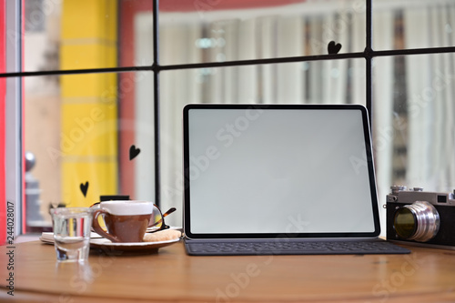Wallpaper Mural Creative photographer desk with mockup blank screen tablet and vintage camera Torontodigital.ca