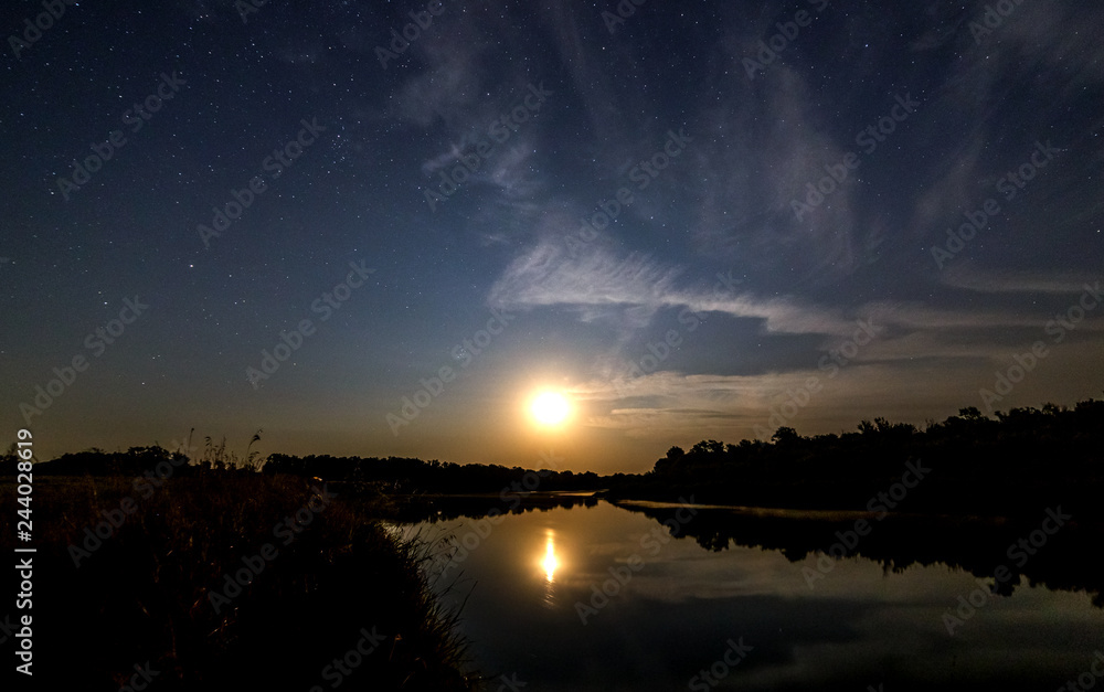 Moonrise over the river. Moonrise over the river.