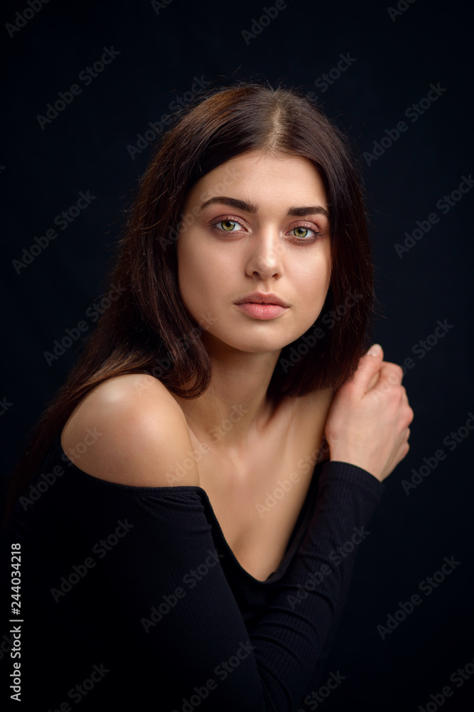 Beauty portrait of a young woman in the studio Beauty portrait of a young woman in the studio