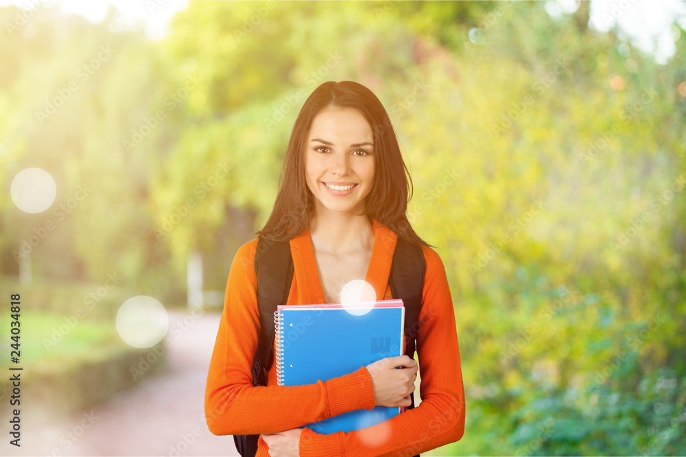 Young Female College Student on background Young Female College Student on background