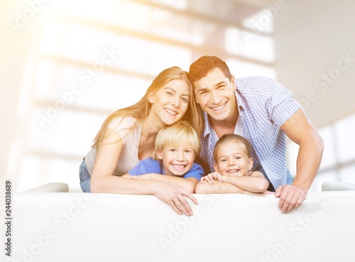Beautiful smiling family on background
