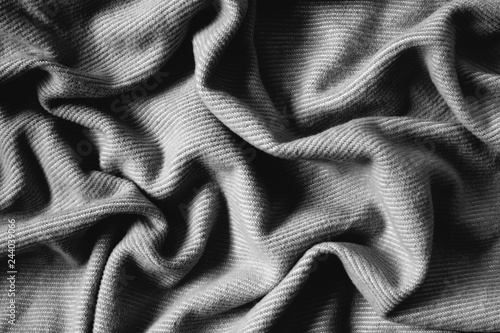 Detail of wrinkles and folds in blanket, overhead view photo