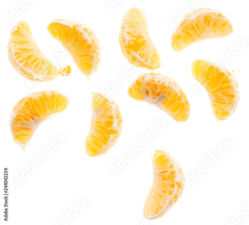 Juicy slices of mandarin isolated on white background