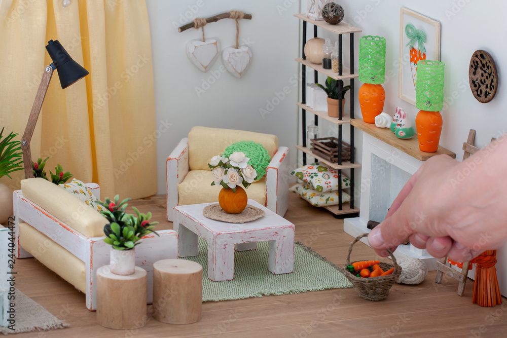 Lovely bright interior of a doll house living room with lite