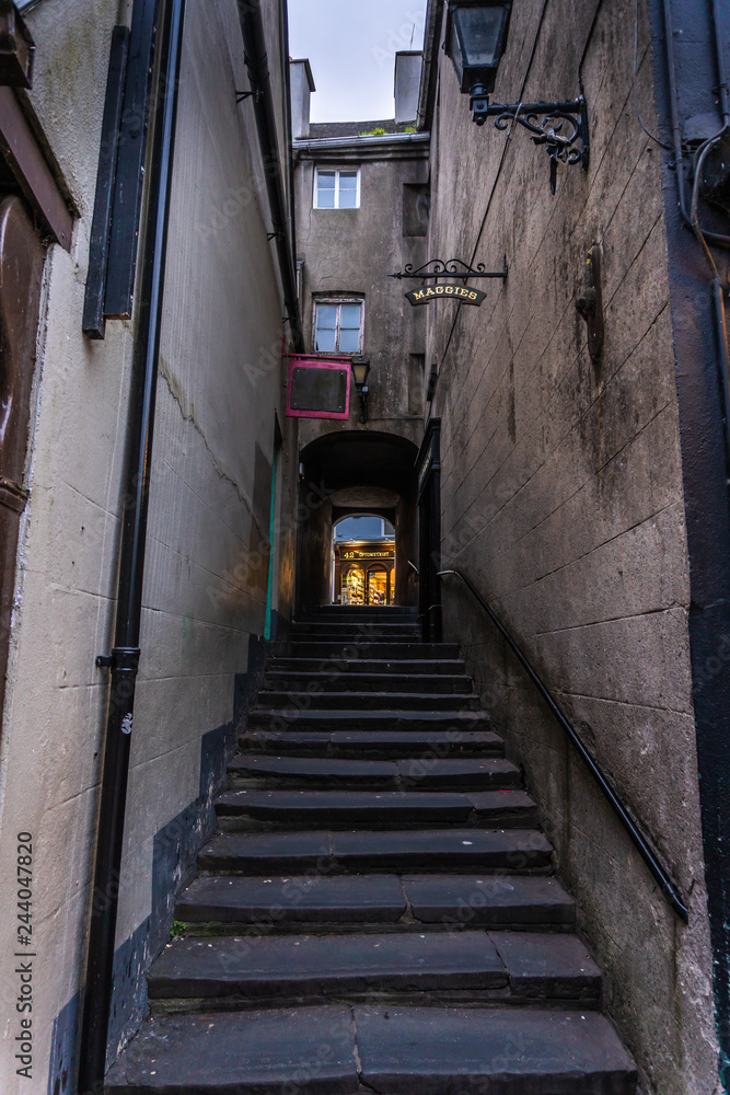 Old street with stairs leading to main street Old street with stairs leading to main street