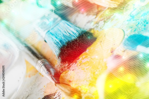 Row of artist paint brushes on background