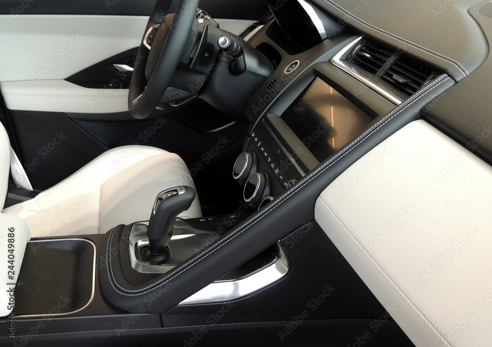 Combination of black and white leather upholstery of premium car interior