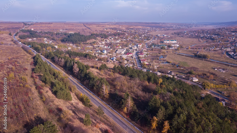 Aerial view of highway crossing villages.