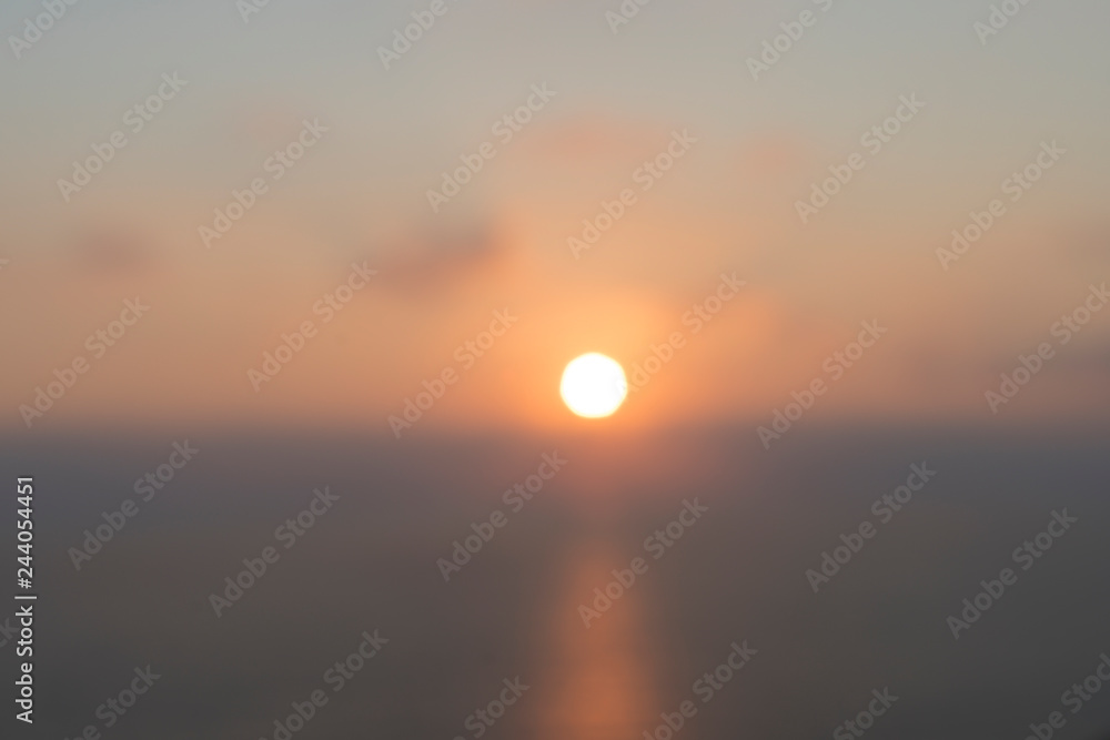 blurred sun over the ocean for backgrounds