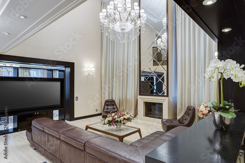 Lighting living room in brown and beige colors.