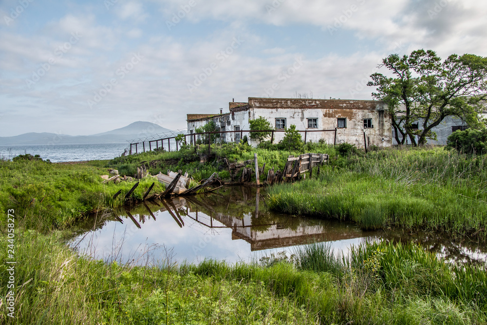 The abandoned building against the background of the nature The abandoned building against the background of the nature