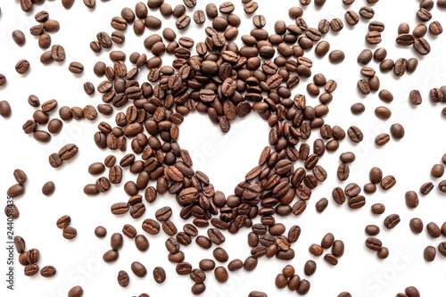 Heart frame of roasted coffee beans with area for copy space.