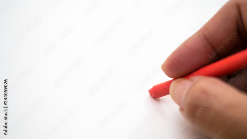 crayon with man hand on white background crayon with man hand on white background